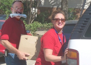 volunteers loading a van