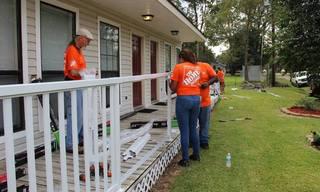 Home_20Depot_20Volunteers_20installing_20a_20railing.jpg