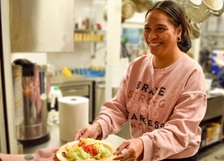 volunteering to serve a meal